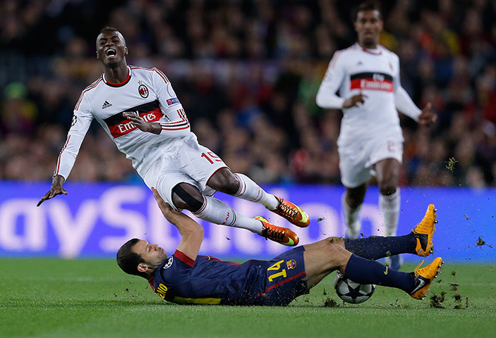 Barcelona v Milan: Javier Mascherano tackles Mbaye Niang