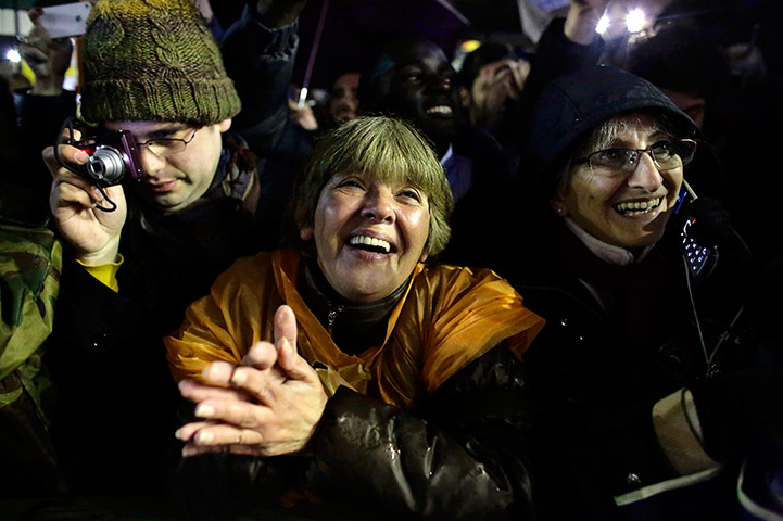 Pope elected gallery: Faithful cheer as white smoke rises from the chimney