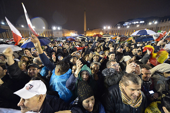 Pope elected gallery: The crowd reacts as the white smoke rises 