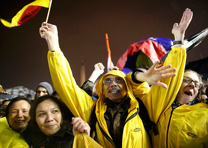 Pope elected gallery: People cheer as they wait for the new Pope to appear