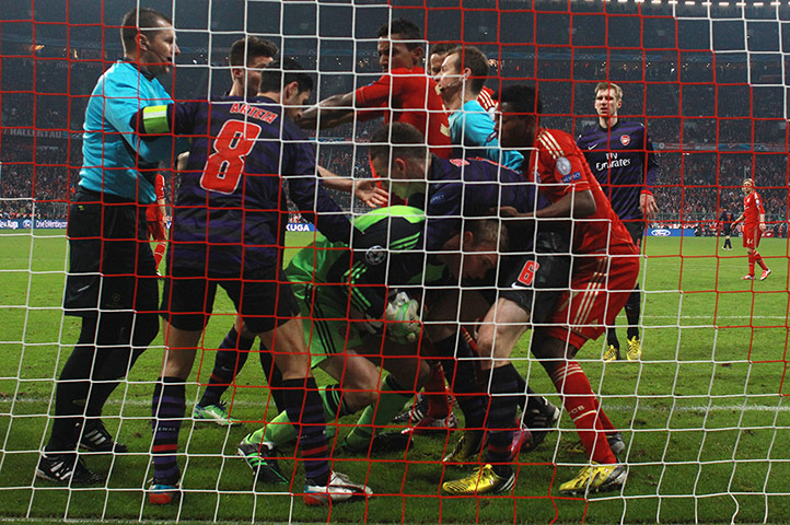 Arsenal v Bayern: An untidy scrummage at the Arsenal v Bayern Munich game