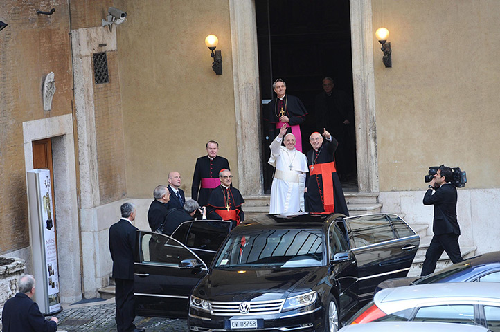 Pope Francis first day: Pope Francis waves as he leaves Santa Maria Maggiore Basilica