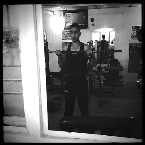 Baghdad: A young man works out in a Baghdad gym
