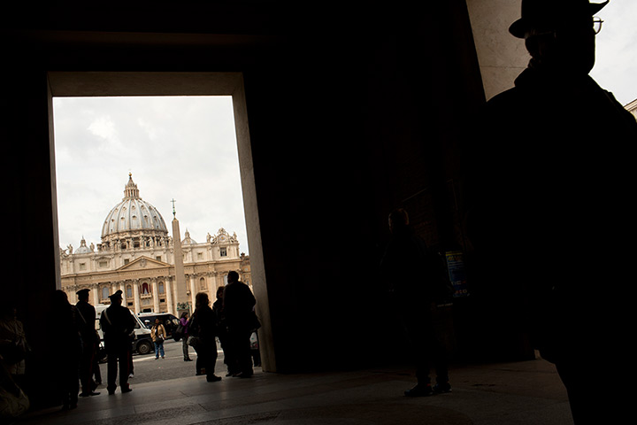 24 hours in pictures: Tourists mill around St. Peter's Basilica  