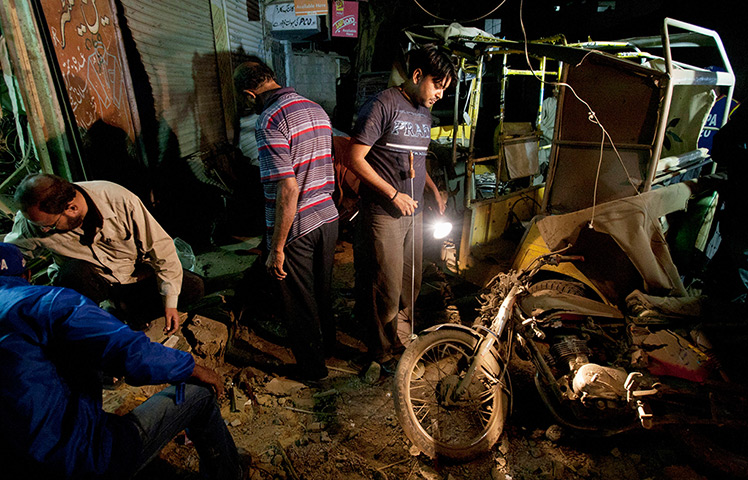 24 hours in pictures: bomb blast in karachi