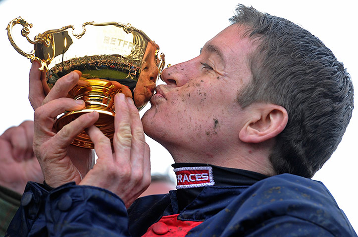 Cheltenham gold cup: Barry Geraghty kisses the trophy