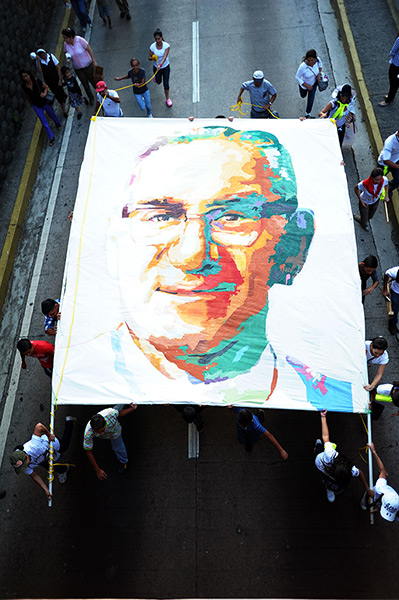 24 hours: San Salvador, El Salvador: People march to commemorate Romero