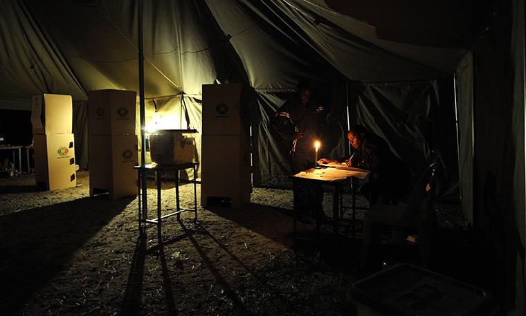 24 hours: Harare, Zimbabwe: Voters cast their votes in a polling station