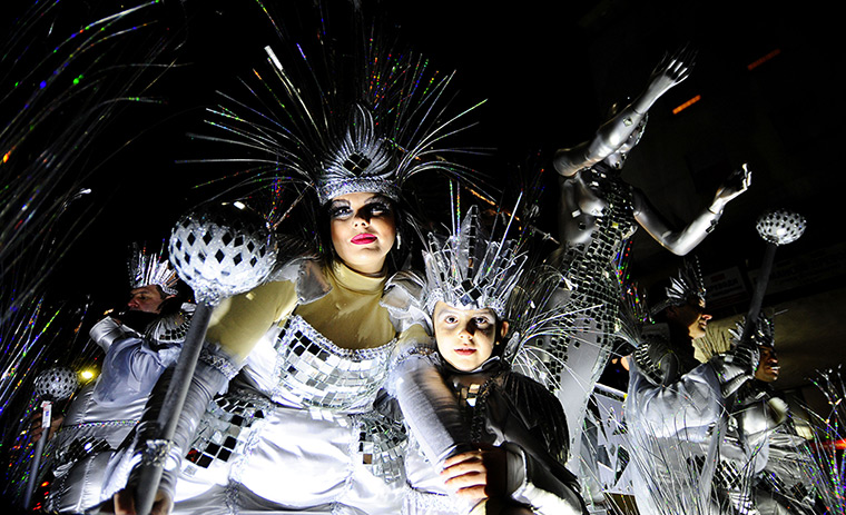 24 hours: Strumica, Macedonia: Revellers perform during a carnival procession