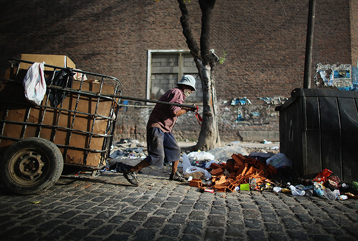 24 hours: Buenos Aires, Argentina: A man pulls a cart 