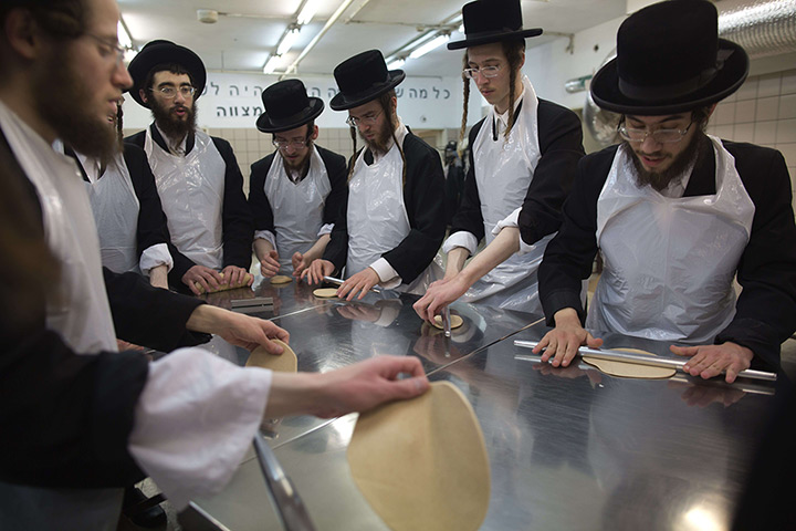 24 hours: Jerusalem: Ultra-Orthodox Jewish men knead dough 