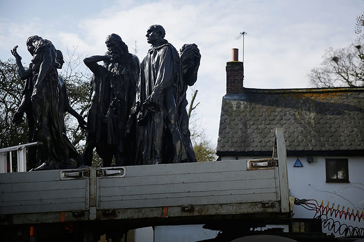 Moore Rodin: Rodin's The Burghers is seen on the back of a truck 