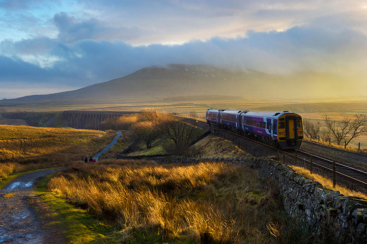 Railways: A train approaches Ribblehead Viaduct 