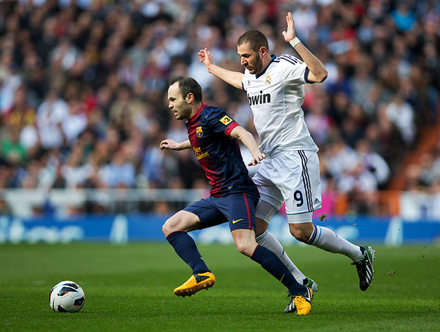 classico: Andres Iniesta gets the better of goalscorer Karim Benzema