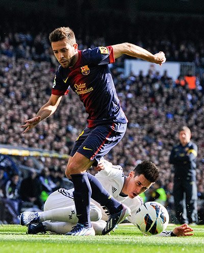 clasico 2: Jordi Alba, left, tussles with Jose Callejon