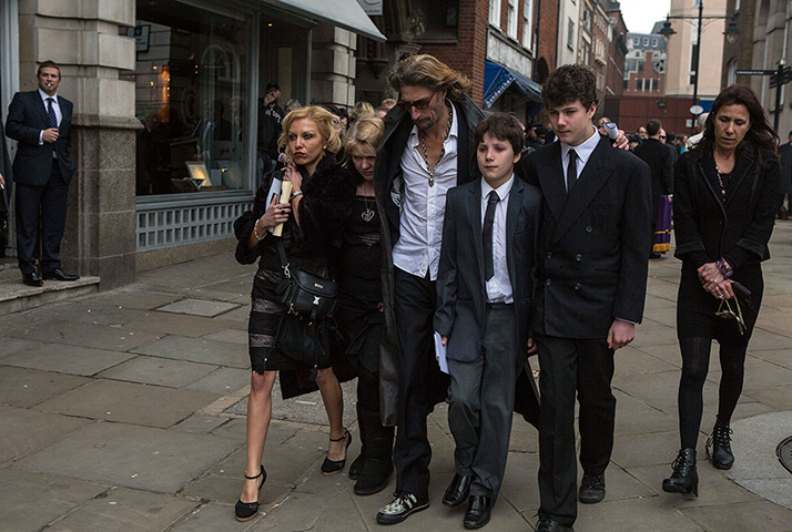 Bruce Reynolds funeral: Nick Reynolds, the son of Bruce Reynolds leaves the funeral with his family
