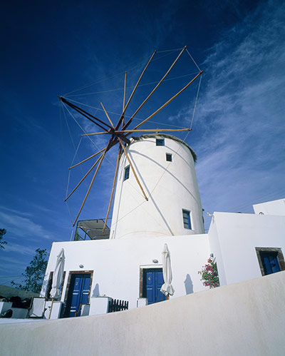 Sunvil Greece 1: Sunvil Greece: White windmill in Oia, Santorini, Greece