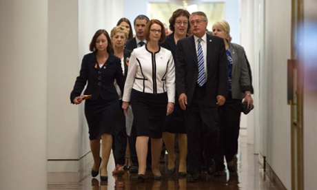 Prime Minister Julia Gillard and her supporters arrive for the meeting of the Labor Caucus