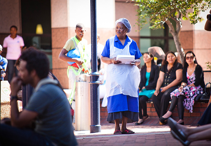 ITC Cape Town: A passerby chances upon the free public performances
