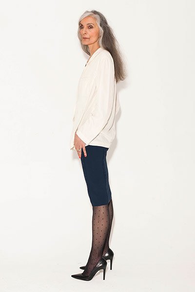 All Ages: Pencil Skirts: Model wears white jumper and navy pencil skirt