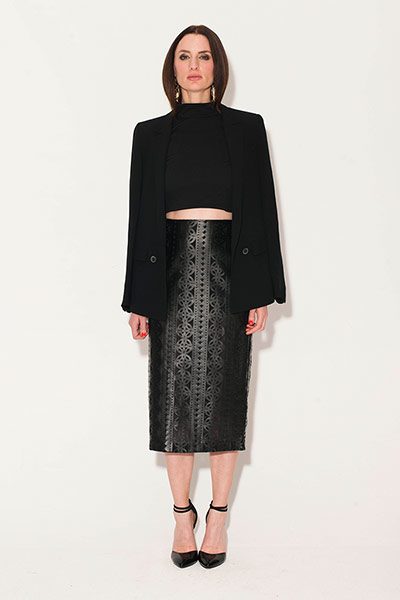 All Ages: Pencil Skirts: Model wears black crop top and black leather cut out skirt