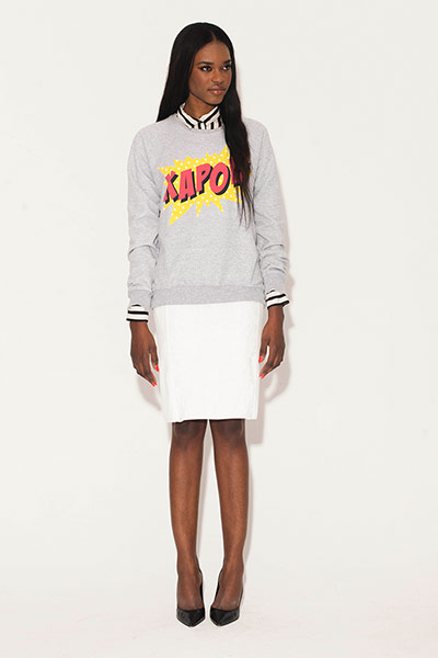 All Ages: Pencil Skirts: Model wears white pencil skirt and jumper with cartoon-strip word