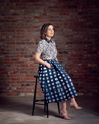 Kirsty Wark: Kirsty Wark wearing floral shirt and blue and white checked skirt
