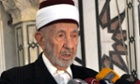 Sunni cleric Mohammed al-Buti speaking at a mosque, in this handout photograph distributed by Syria's national news agency SANA on March 21, 2013. A blast at a mosque in central Damascus on Thursday killed Buti, state television said. Buti, believed to be in his 90s, was a staunch supporter of President Bashar al-Assad and the Imam of Damascus's historic Ummayyad Mosque. REUTERS/SANA/Handout (SYRIA - Tags: POLITICS CIVIL UNREST RELIGION)  ATTENTION EDITORS - THIS PICTURE WAS PROVIDED BY A THIRD PARTY. REUTERS IS UNABLE TO INDEPENDENTLY VERIFY AUTHENTICITY, CONTENT, LOCATION OR DATE OF THIS IMAGE. FOR EDITORIAL USE ONLY. NOT FOR SALE FOR MARKETING OR ADVERTISING CAMPAIGNS. THIS PICTURE IS DISTRIBUTED EXACTLY AS RECEIVED BY REUTERS, AS A SERVICE TO CLIENTS :rel:d:bm:GF2E93L1EJX01