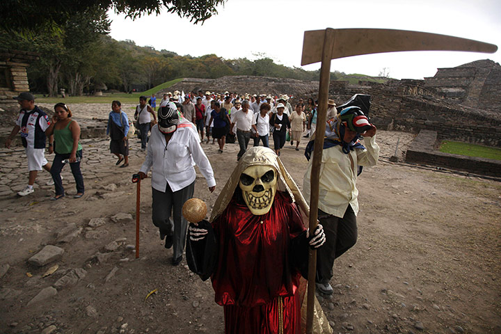 24 hours: Papantla, Mexico: People march during a protest at Tajin