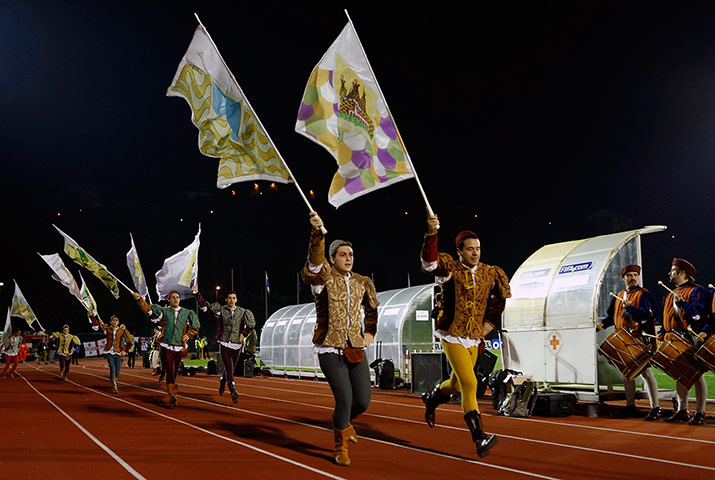 San Marino versus England: Flag bearers perform a show