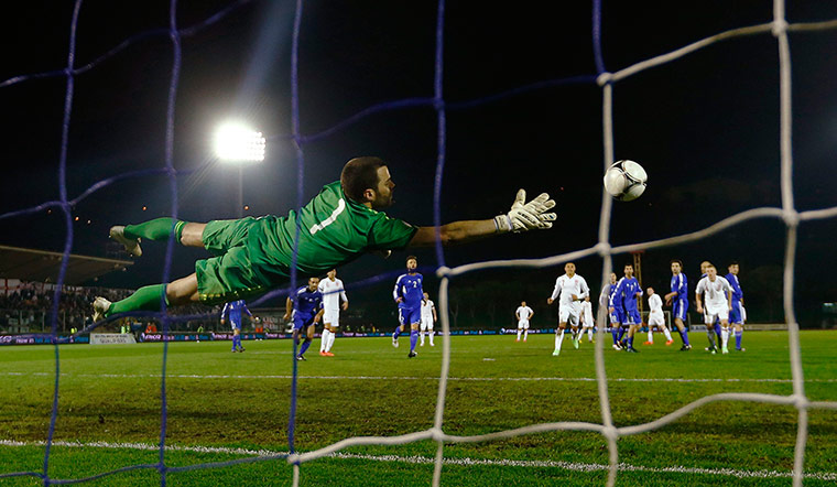 San Marino v England 2: England's Wayne Rooney (unseen) scores a free kick