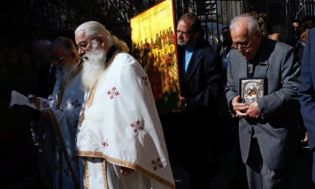 Cypriots gather for Sunday mass at an Orthodox church on  March 24, 2013.