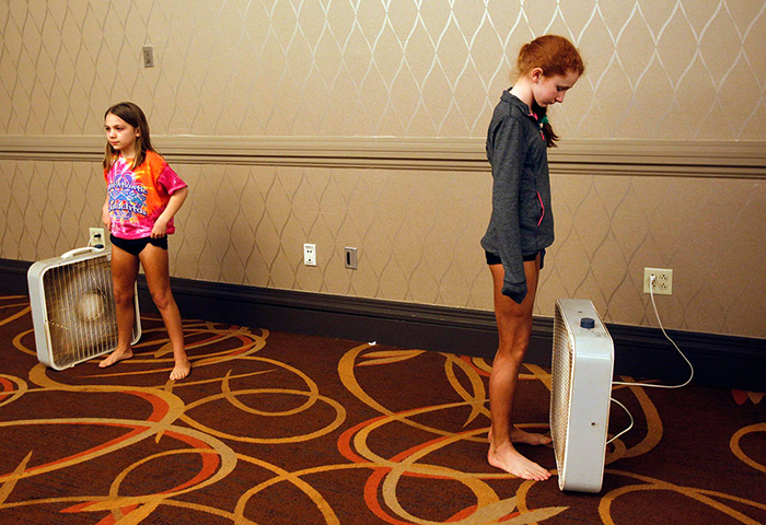 24 hours in pictures : Girls at World Irish Dancing Championships wait for tans to dry