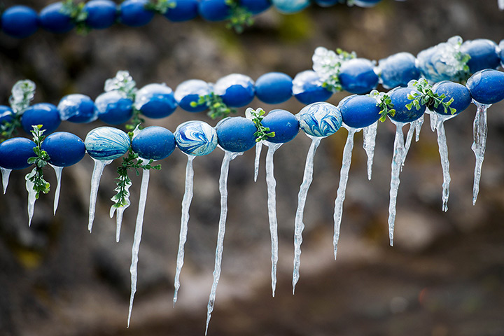 24 hours in pictures : Icicles hang on a decorated Easter fountain