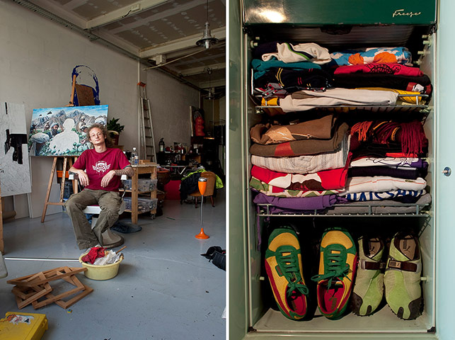 Big Picture - Fridges: young man sits in artist studio with pic of fridge full of clothes