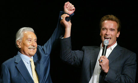 Joe Weider, left, and Arnold Schwarzenegger