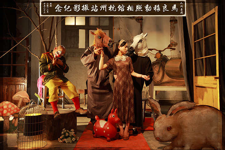 Maleonn's studio mobile: Tableau including people wearing horse masks