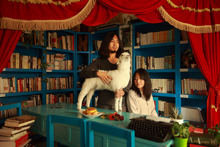 Maleonn's studio mobile: A couple posing with a sheep