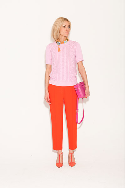 All Ages : pink cable knit jumper red trousers red shoes