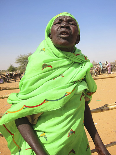 Darfur fashion: Elderly women wear bright colours