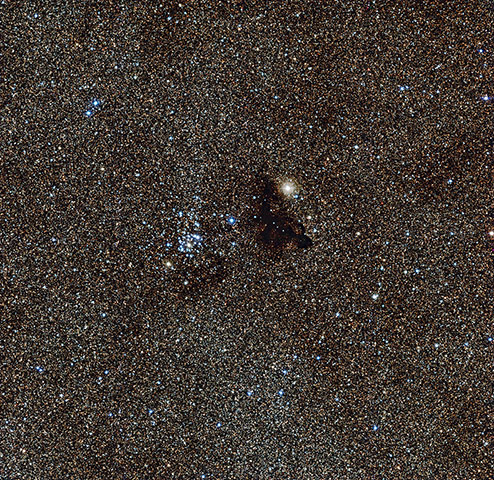 A month in Space: Star cluster NGC 6520 and the strangely shaped dark cloud Barnard 86