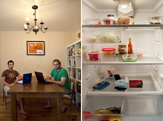 Big Picture - Fridges: two men around table with laptops with empty fridge picture next to them