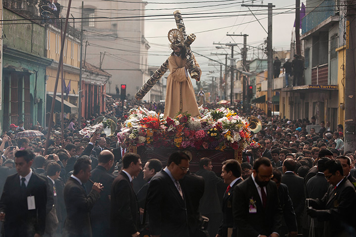 24 hours: Guatemala City, Guatemala: Parishioners parade the Jesus Nazareno 