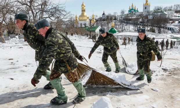 Snow patrol -  Ukrainian soldiers clear the grounds of the Pechersk Lavra, an Orthodox Christian monastery, in downtown Kiev, Ukraine. Over the last three days, 74 thousand tons of snow have been removed from the capital.