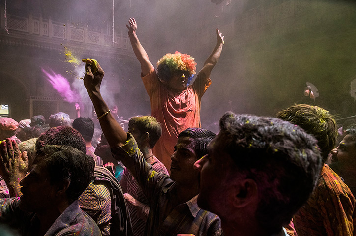 Holi festival: Hindu devotees at the Banke Bihari temple in Vrindavan, India