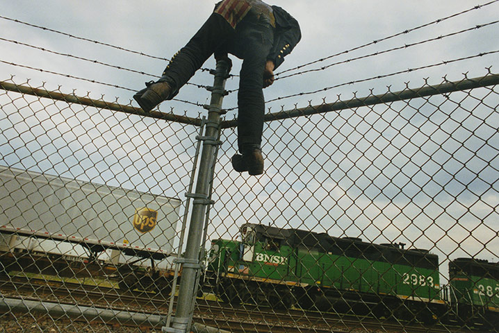 Train Riders: Scaling fence
