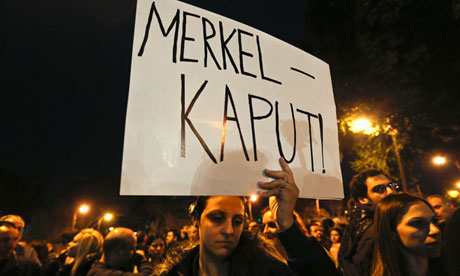 Anti-German feeling . . . an employee of Cyprus Popular Bank at a protest last month.