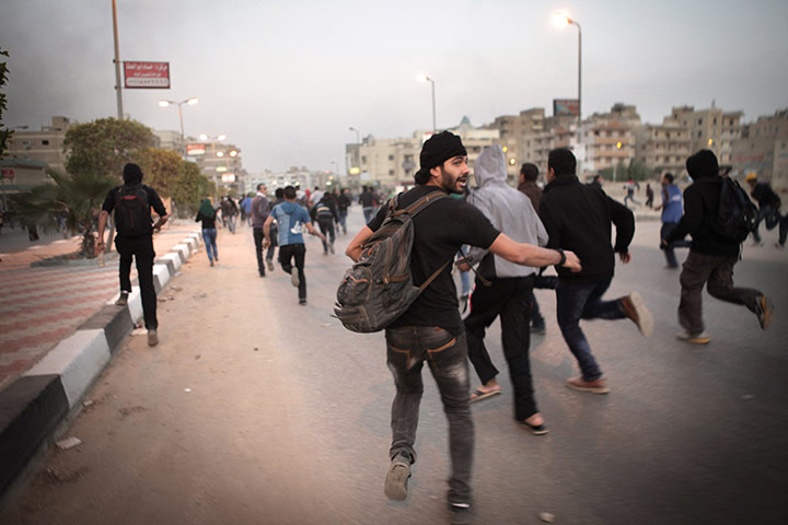 Calton's Cairo: Running protestors