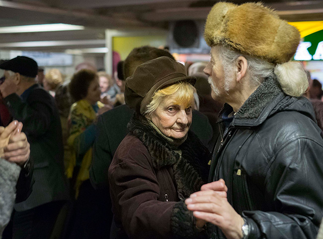 24 hours in pictures: Pensioners dance in a subway in central Kiev