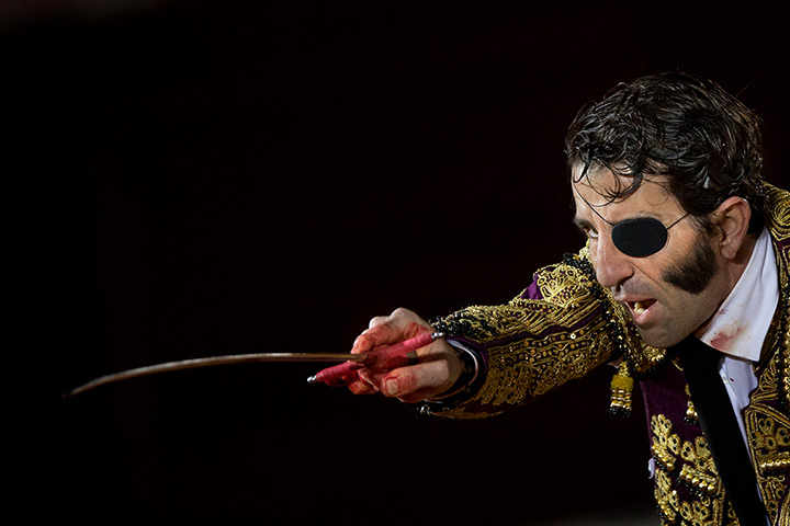 24 hours in pictures: Spanish bullfighter Juan José Padilla aims his sword before killing a bull 
